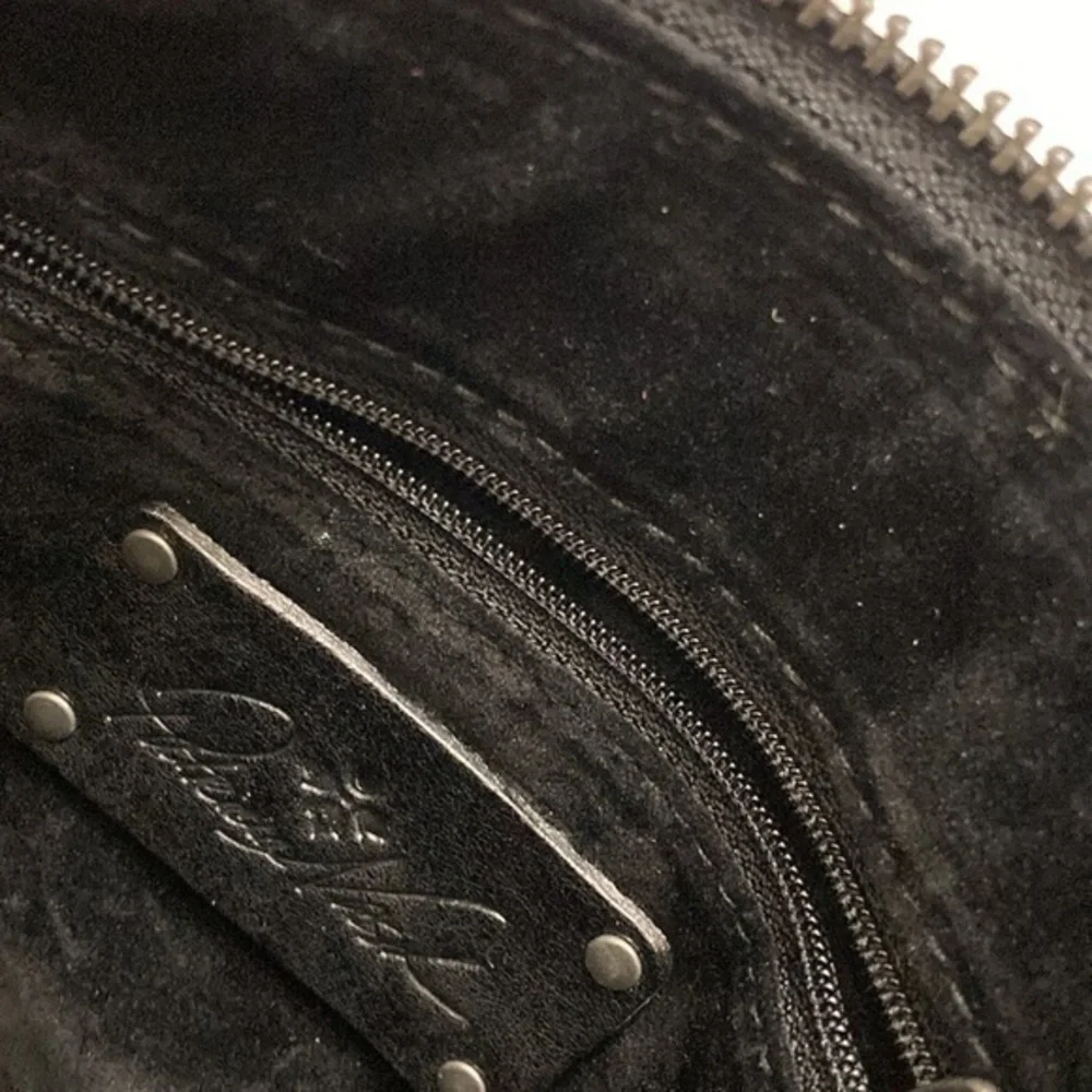 Patricia nash black embossed leather wristlet bag